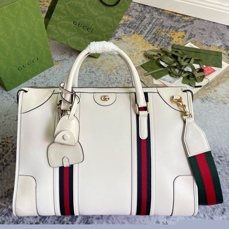 G*u*i top handle bags